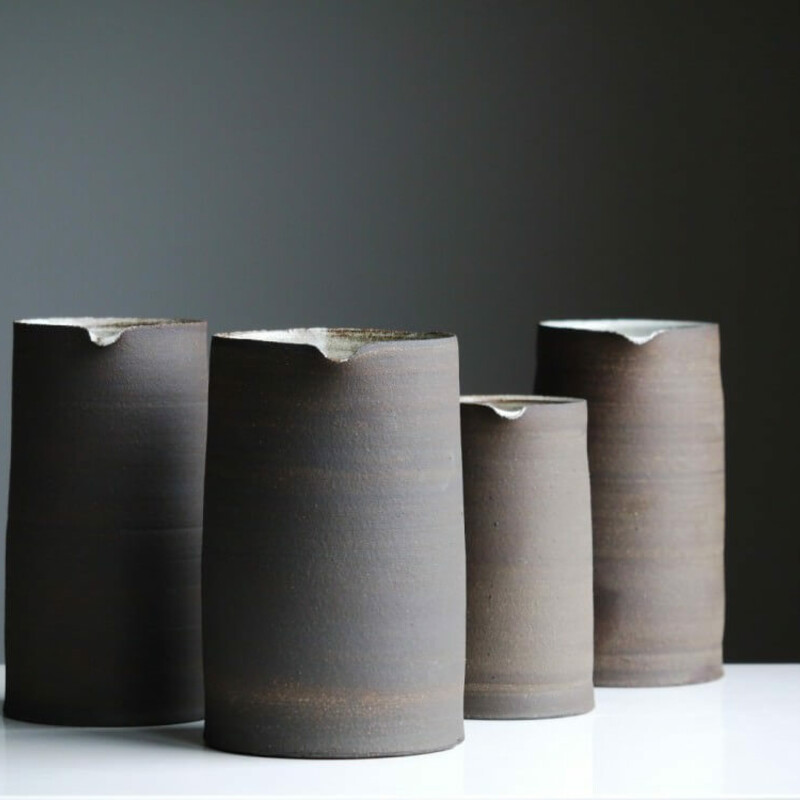 A cute little family of four vases.